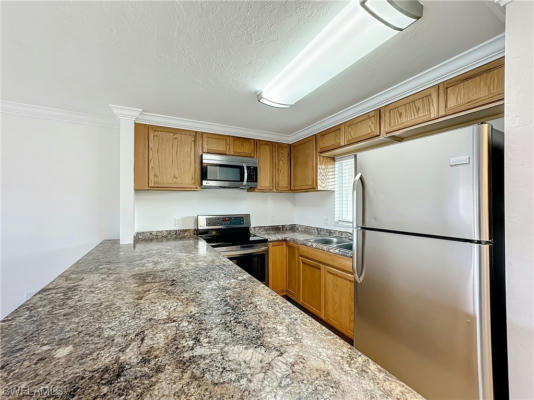 6102 WHISKEY CREEK DR APT 203, FORT MYERS, FL 33919, photo 5 of 46