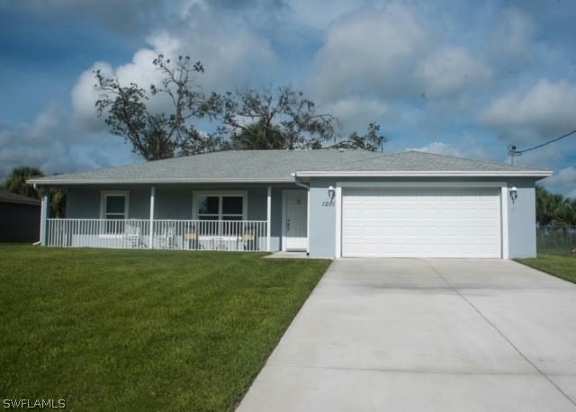 1201 BANJO CT, LABELLE, FL 33935, photo 1 of 23